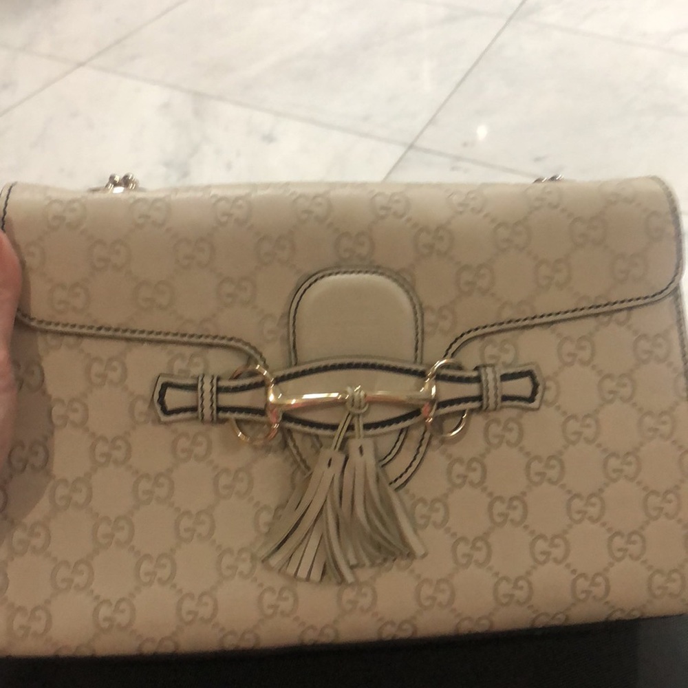 Ivory Gucci authentic bag. NWOT. This is the latest Gucci trending bag. - Picture 13 of 14